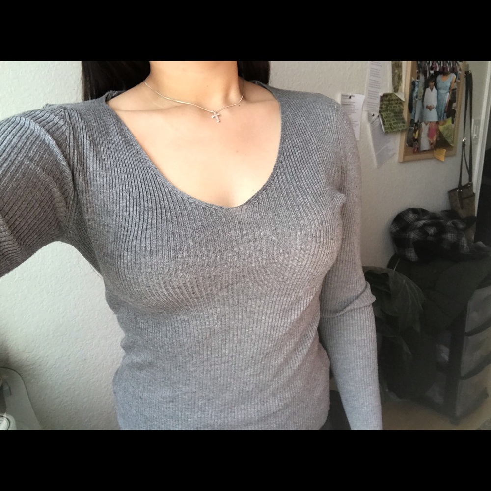 Grey long sleeve v-neck shirt